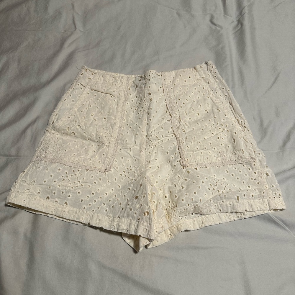 off white, eyelet fabric shorts